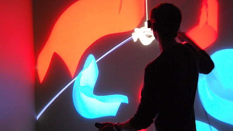 Image visitor interacting with installation